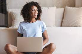 Woman smiling with laptop